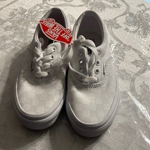 Selling kids Vans brand new never used. White and light great